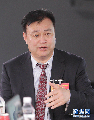 2015年3月12日，全国政协委员、民建天津市委会副主委、天津市庆达投资集团有限公司董事长孙太利作客新华访谈两会特别节目。图为孙太利在访谈现场。 新华网 郭 研 摄