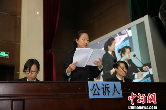 图为庭审现场。 王益武 摄 图为庭审现场。 王益武 摄