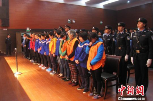 资料图：2015年1月26日，“2011·6·8”特大跨国拐卖婴幼儿案二审宣判。　李敏军 摄