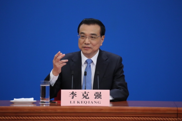 新华社照片，北京，2017年3月15日 
    李克强总理与中外记者见面 
    3月15日，国务院总理李克强在北京人民大会堂与中外记者见面，并回答记者提问。
    新华社记者邢广利摄

