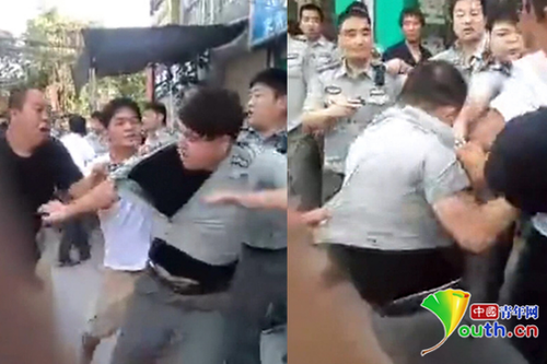 西瓜摊主占道经营遇城管 抗拒执法还掀翻执法车