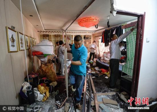 资料图：北京整治群租房。图片来源：视觉中国