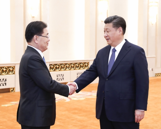习近平会见韩国总统特使郑义溶