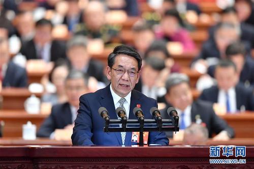 吴伟仁委员作大会发言。 新华社记者 殷博古 摄