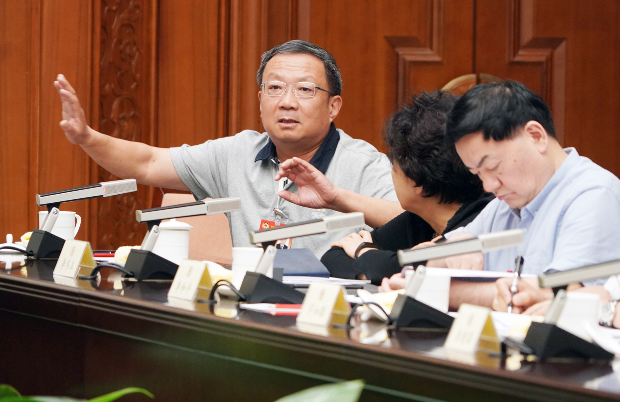 全国政协十三届常委会第七次会议小组讨论现场