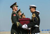 第六批在韩中国人民志愿军烈士遗骸交接仪式在韩国举行