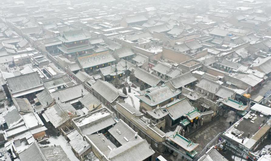 山西平遥古城迎春雪