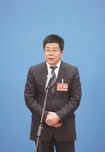 顾学明