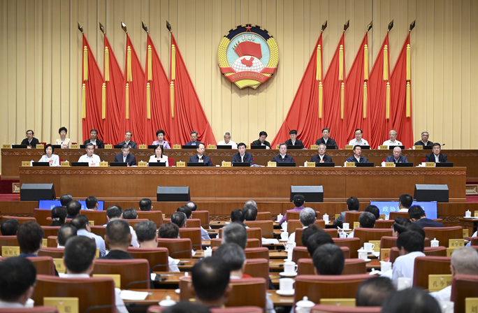 全国政协十四届常委会第七次会议开幕 王沪宁主持 丁薛祥作报告
