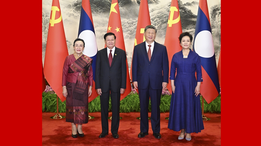 习近平同老挝人革党中央总书记、国家主席通伦会谈