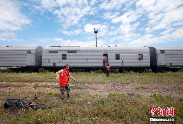 马航遇难乘客遗体将运至秘密地点2