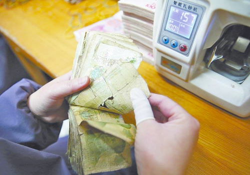 河南洛阳一企业用残损纸币发电3