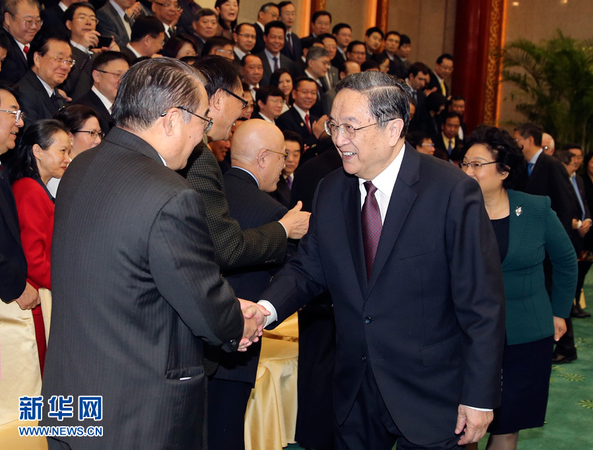 12月15日，中共中央政治局常委、全国政协主席俞正声在北京会见参加“纪念中美建交35周年研讨会”的侨界和专家学者代表。 新华社记者丁林 摄