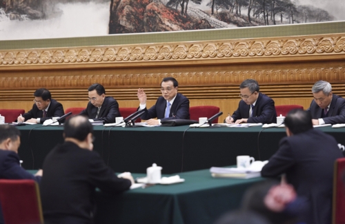 3月9日，中共中央政治局常委、国务院总理李克强参加十二届全国人大四次会议广东代表团的审议。新华社记者李学仁摄