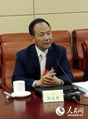 全国政协委员、国家行政学院原副院长周文彰