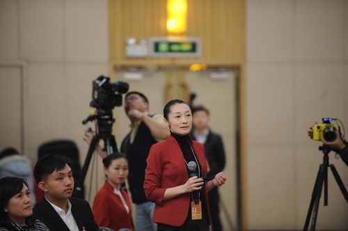 中国教育电视台记者提问。