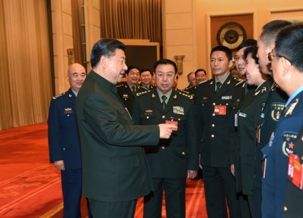 习近平：加快建立军民融合创新体系 为我军建设提供强大科技支撑