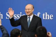 国家质检总局局长支树平向记者挥手致意