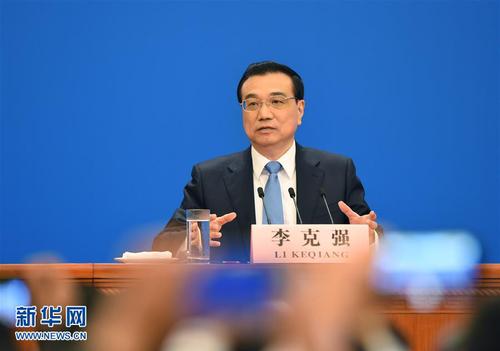 3月15日，国务院总理李克强在北京人民大会堂与中外记者见面，并回答记者提问。 新华社记者 杨宗友 摄