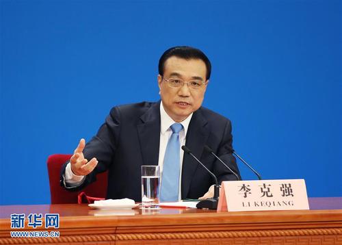 国务院总理李克强在北京人民大会堂与中外记者见面，并回答记者提问。 新华社记者 金立旺 摄