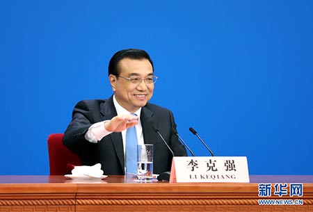 3月15日，国务院总理李克强在北京人民大会堂与中外记者见面，并回答记者提问。-新华社记者-王晔-摄