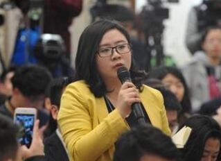 图为团结报记者提问