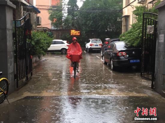 资料图：6月23日清晨，北京降雨持续，并出现了短时大雨。 <a target='_blank' href='http://www.chinanews.com/' >中新网</a>记者 富宇 摄