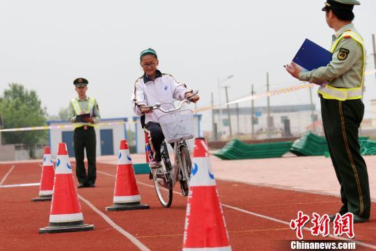 10月新规：侮辱国歌或被追究刑责 驾考有9大变化
