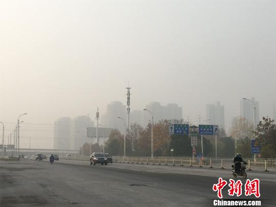 空气污染持续湖北连续两天拉响霾黄色预警（图）