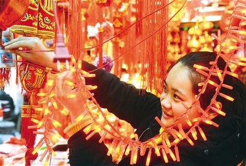 春节消费红红火火：民乐奏响中国风网购年货成潮流