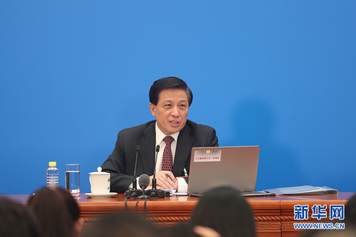 图为张业遂回答记者提问。新华网中国政府网 陈杰 摄