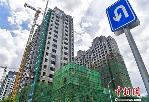 资料图： 图为一在建楼盘 <a target='_blank' href='http://www.chinanews.com/'>中新社</a>记者 骆云飞 摄
