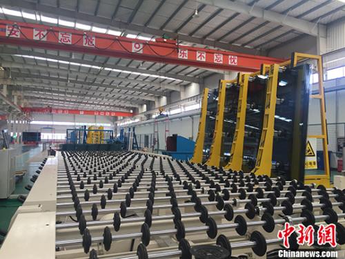 资料图：生产车间。 <a target='_blank' href='http://www.chinanews.com/'>中新社</a>记者 吴兰 摄