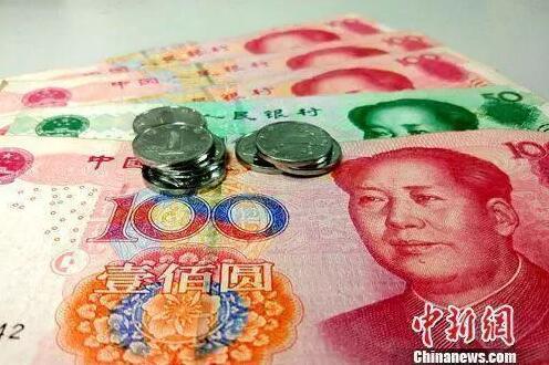 此次公积金贷款还调整了月还款额。资料图：人民币。<a target='_blank' href='http://www.chinanews.com/' >中新网</a>记者 李金磊 摄