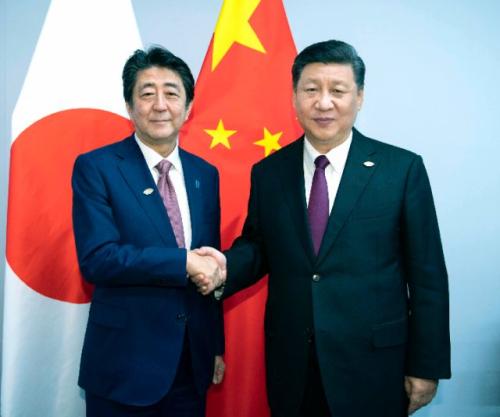 ——会见日本首相安倍晋三，指出双方要建设性地把握好中日关系发展方向，在中日四个政治文件原则基础上，共同开辟两国关系新前景。