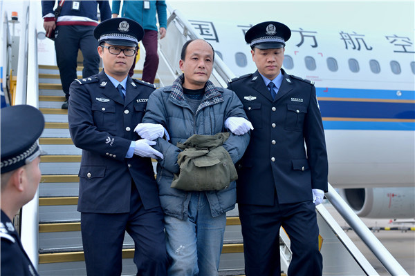 红通人员周骥阳被公诉:诈骗1.2亿 潜逃9年被抓获