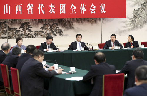 3月12日，中共中央政治局常委、中央书记处书记王沪宁参加十三届全国人大二次会议山西代表团的审议。新华社记者 丁海涛 摄