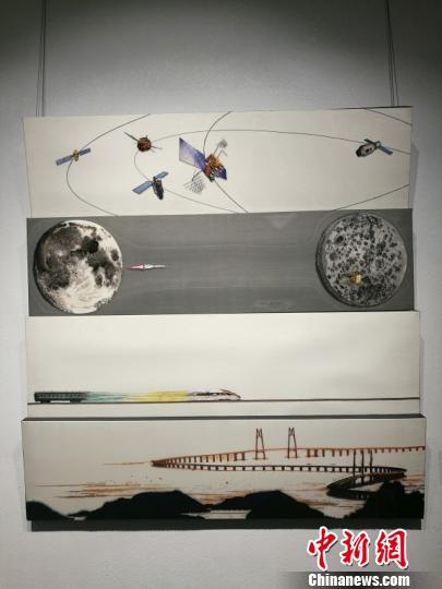 随着时代发展，传统的刺绣也与时俱进地以一些热点题材作为创作主题。　钟升 摄