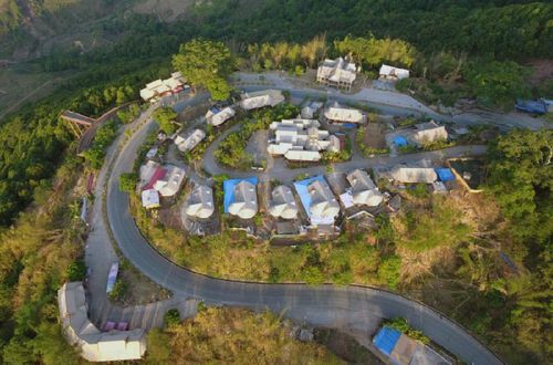云南省西盟佤族自治县勐梭镇秧洛村到周边山村和县城的公路（2019年5月28日无人机拍摄）。