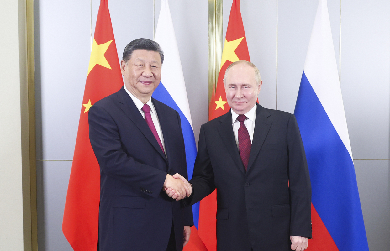 习近平会见俄罗斯总统普京